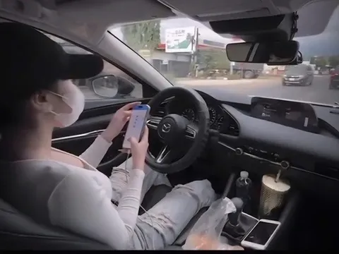 Xác minh clip cô gái thả 2 tay, lướt điện thoại khi lái ô tô